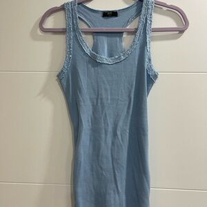 Italian tee shirt in baby blue one size fits all never worn